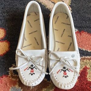 Minnetonka White Moccasins with Beaded Thunderbird.